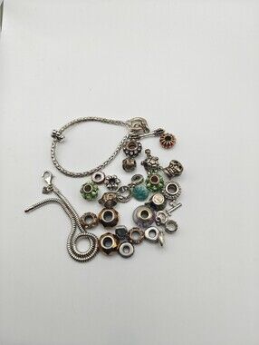 1 Pandora 925 Bracelet & 1 Unmarked  Bracelet And 23 Charms